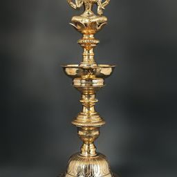Exotic India Gold Toned Textured Brass Pooja Diya-picture-6