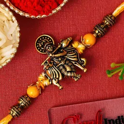 eCraftIndia Artfificial Stones Studded And Beaded Krishna Rakhi With Roli Chawal-image-48
