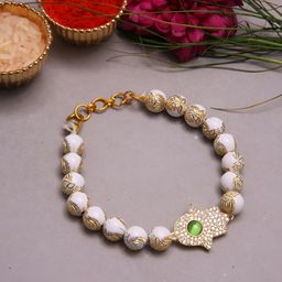 Myntra Elegant Homes Beads And Healing Stone Rakhi Gift Set-image-14