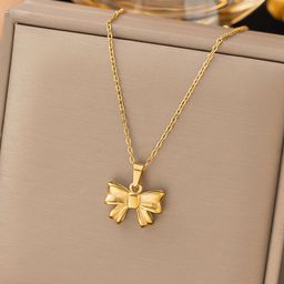 Jewels Galaxy Stainless Steel Gold Plated Bow Shaped Pendant with Chain-picture-10