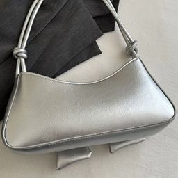 StyleCast Structured Handheld Bag with Cut Work image 2