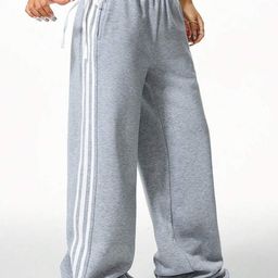 The Roadster Lifestyle Co. Women Striped Mid-Rise Loose Fit Parachute Trousers-image-87