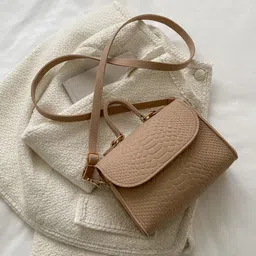 DressBerry Women Textured Oversized Bucket Sling Bag with Tasselled-15