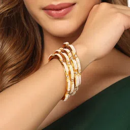 NVR Women Set of 4 Gold Plated Pearl Studded Bangles-26