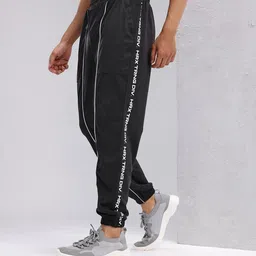 HRX by Hrithik Roshan Men Typography Print Mid-Rise Rapid-Dry Running Joggers-image-79