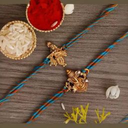 eCraftIndia Set of 2 Blue Orange & Golden Religious Rakhis with Sibling Agreement & Roli Chawal Pack-image-30