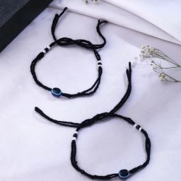 NVR Black Evil Eye Rakhi with Roli Chawal - Set of 2 image 1