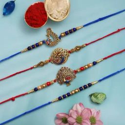 eCraftIndia Set of 4 Blue, Red, & Golden Peacock Rakhis with Sibling Agreement & Roli Chawal-image-63