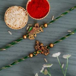 eCraftIndia Set of 2 Green & Golden Religious Rakhis with Sibling Agreement & Roli Chawal Pack-17