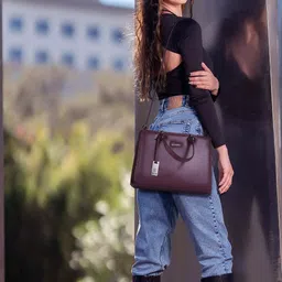Exotic Structured Handheld Bag with Cut Work image 5