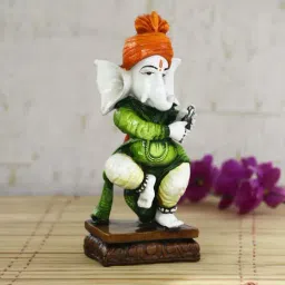 eCraftIndia Lord Ganesha playing instrument Decorative Showpiece-image-56