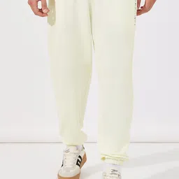Styli Men Cream-Coloured Mid-Rise Oversized Fit Joggers-image-66