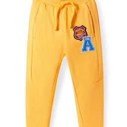 Babyhug Terry KnitFull Length Cut & Sew Track Pants with Sport Theme & Text Print - Yellow-image-73