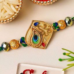 eCraftIndia Artfificial Stones Studded And Beaded Peacock Feather Rakhi-image-47