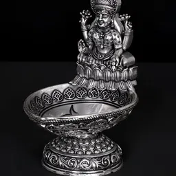 Exotic India Silver-Toned Goddess Lakshmi Diya Brass Idol Showpiece-image-61