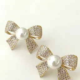 Celestique Cubic Zirconia & Pearls Studded Bow Shaped Studs-93