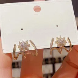 VAGHBHATT Gold-Toned Cubic Zirconia Studded Starburst Dual-Band Statement Floral Studs image 4