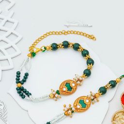 eCraftIndia Set of 2 Artfificial Stones Studded And Beaded Peacock Feather Rakhi-image-61