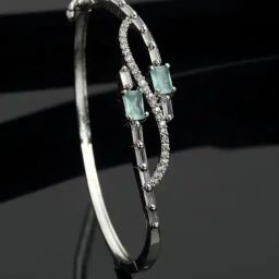 Zeneme Rhodium Plated Silver Toned Green Crystal Studded Sleek Minimal Bracelet-image-62