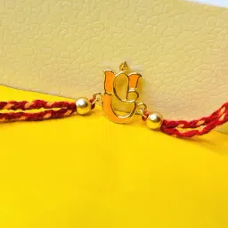 Arte jewels 925 Gold-toned,red,yellow rakhi, has Ganpati, charm-image-1