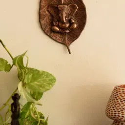 eCraftIndia Metal wall hanging of Lord Ganesha on Leaf-image-9