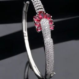 Zeneme Rhodium Plated Silver Toned Red American Diamond Charming Bracelet-17