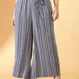 CURVE BY KASSUALLY White & Black Printed Pants With Tie-Up Belt image 1