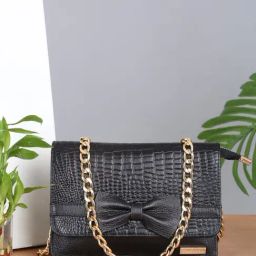 Teakwood Leathers Black Textured Leather Sling Handbag With Bow-image-52