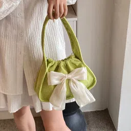 StyleCast x Revolte Textured Handheld Bag with Bow Details-38