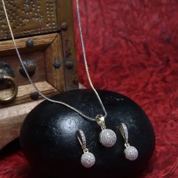 Zeneme Gold Plated Round American Diamond Studded Pendant With Chain & Earring Set-21