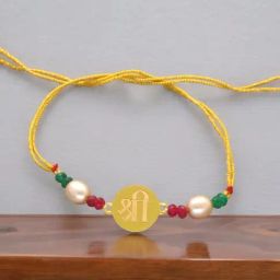 Sri Jagdamba Pearls 22KT Regal Shree Gold Rakhi-image-93