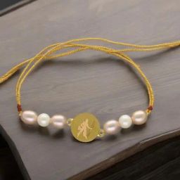 Sri Jagdamba Pearls 22kt Lord Rama Gold Rakhi-image-92