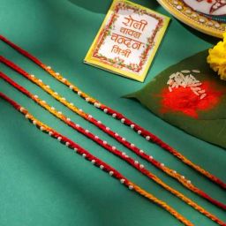 NVR Red Traditional Thread Rakhi with Roli Chawal Chandan & Mishri - Set of 4-0