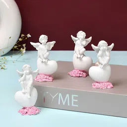 Myntra Elegant Homes White And Pink Set Of 4 Angel Figurine Showpiece-image-52