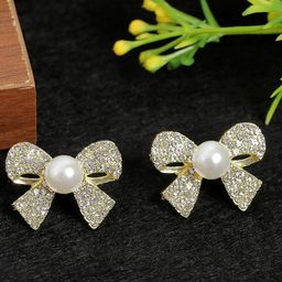 VAGHBHATT Gold-Plated Stones Studded & Pearls Beaded Bow Shaped Studs-49