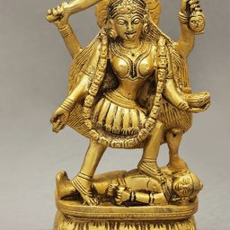 Exotic India Gold Toned Goddess Kali Brass Showpiece-image-12