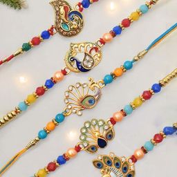 MEIRA JEWELLERY Set Of 5 Peacock Rakhis With Greeting Card & Roli Chawal-image-78
