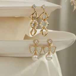 Aatmana Set Of 2 Gold Plated Pearl Beaded CZ Studded Bow shaped Contemporary Drop Earrings-image-52