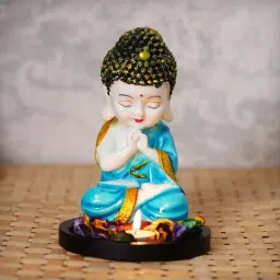 eCraftIndia Praying Blue Monk Buddha with Wooden Base, Fragranced Petals and Tealight-image-82