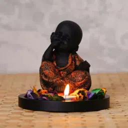 eCraftIndia Decorative Smiling Copper Monk Buddha with Wooden Base, Fragranced Petals and Tealight-26