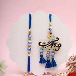 Myntra Elegant Homes Set Of 2 Peacock Rakhis With Greeting Card & Roli Chawal-image-6