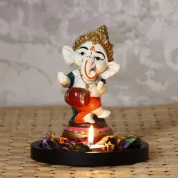 Colorful Lord Ganesha Dancing Avatar Showpiece with Wooden Base, Fragranced Petals and Tealight-image-46