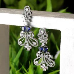 Zeneme Rhodium Plated Blue AD Studded Paisley Shaped Dangler Earrings-image-85