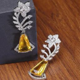 Zeneme Rhodium Plated Yellow AD Studded Floral Theme Drop Earrings-image-95