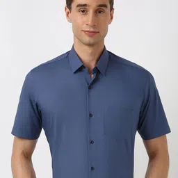 Peter England Men Spread Collar Solid Cotton Formal Shirt-image-99