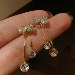 Celestique Artificial Stones Studded Bow Shaped Drop Earrings-34