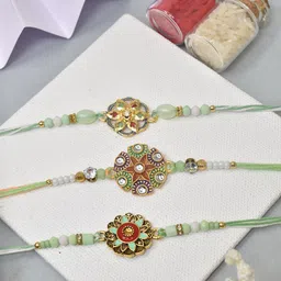 MEIRA JEWELLERY Set Of 3 Flower Designer Rakhis With Greeting Card & Roli Chawal-69