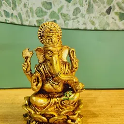 Aakrati Yellow Lord Ganesha Idol Brass Showpiece-image-60