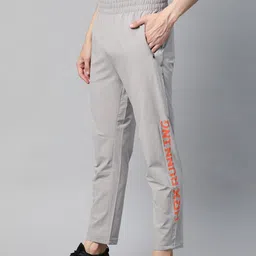 HRX by Hrithik Roshan Men Grey Solid Slim Fit Rapid-Dry Antimicrobial Running Track Pants-image-38