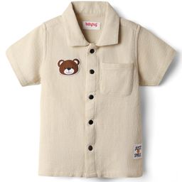 Babyhug Cotton Woven Half Sleeves Resort Collar Solid Shirt With Teddy Bear Patch - Cream-image-24